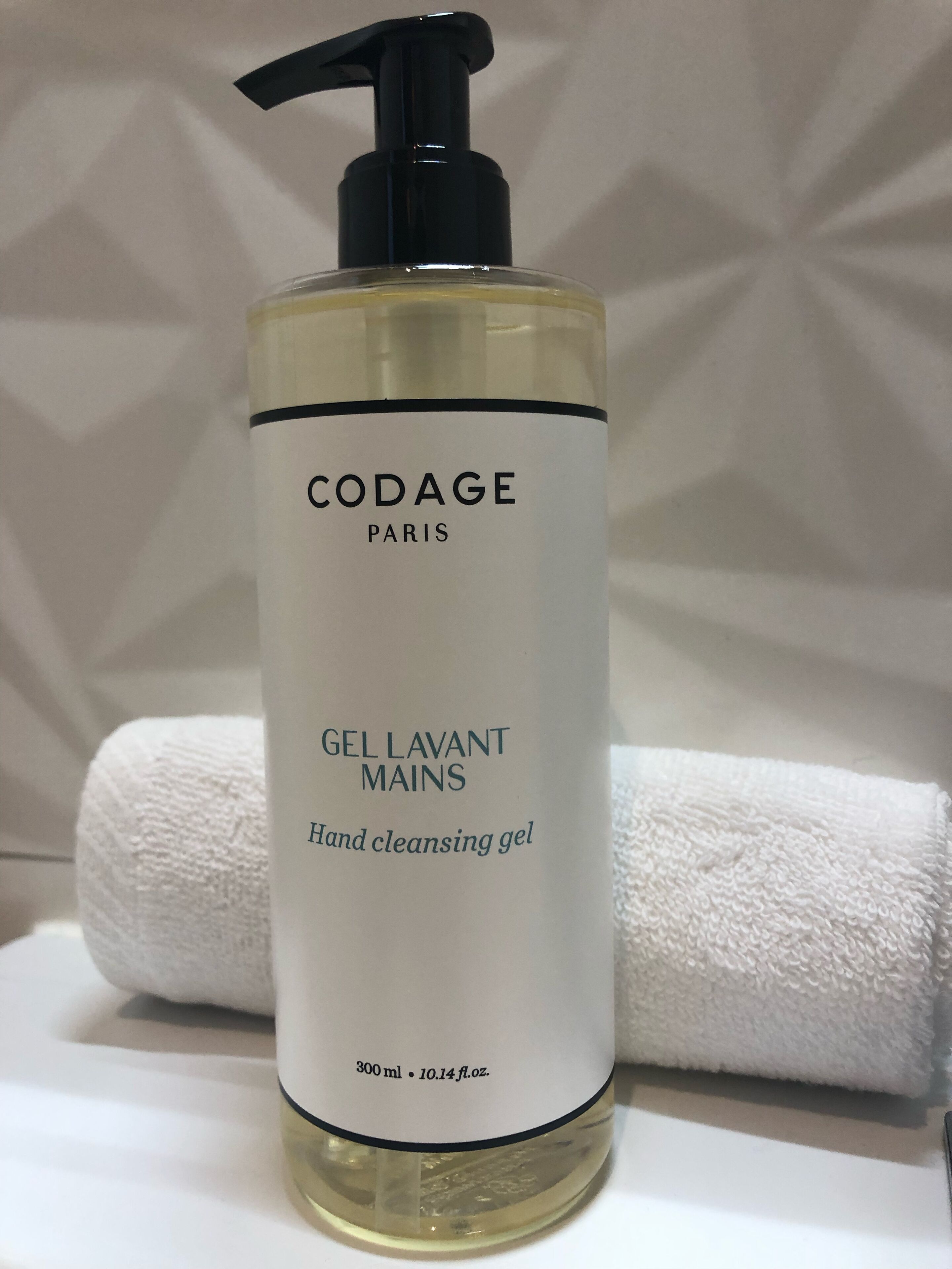 A bottle of Codage Paris hand cleansing gel.