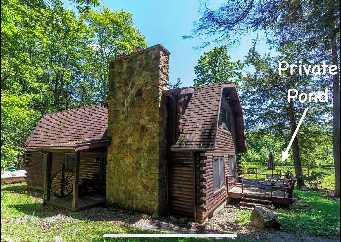 "Timber Acres" is nestled in the woods with private pond in Eagles Mere