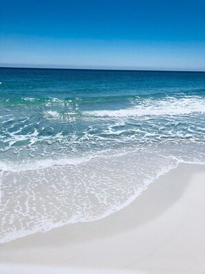 On the beach, sun-loungers