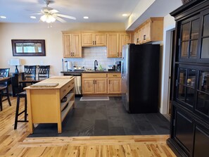 Fridge, microwave, oven, stovetop - 5-star 3-bedroom home with theater and hot tub! (Hurricane)