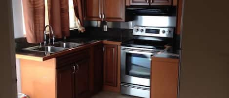 Room, Multiple Beds (Budokan 2 -room 2) | Private kitchen | Fridge, microwave, stovetop, cookware/dishes/utensils