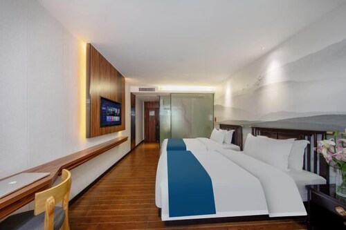 Wenxing Hotel (Guangzhou Baiyun Mountain Plum Garden Metro Station)