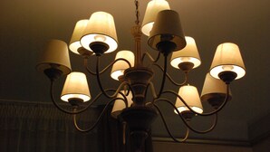 A chandelier with multiple lampshades. - Casa Gotica Residence (Brasov)