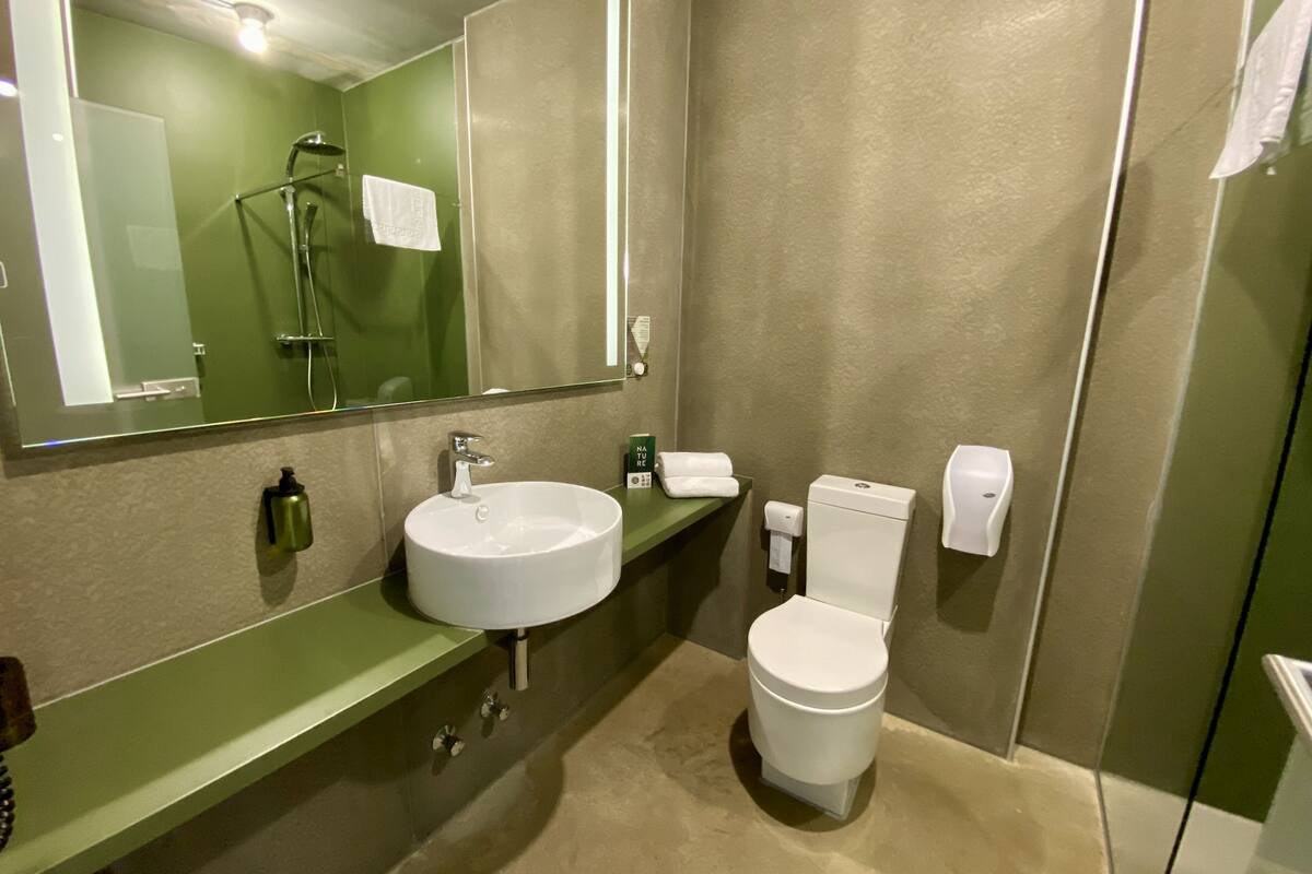 shower, rainfall showerhead, designer toiletries, hair dryer