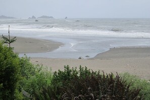 On the beach, beach towels - Oceanfront home, private beach staircase; Family & Pet Friendly. Low Rates! (Brookings)