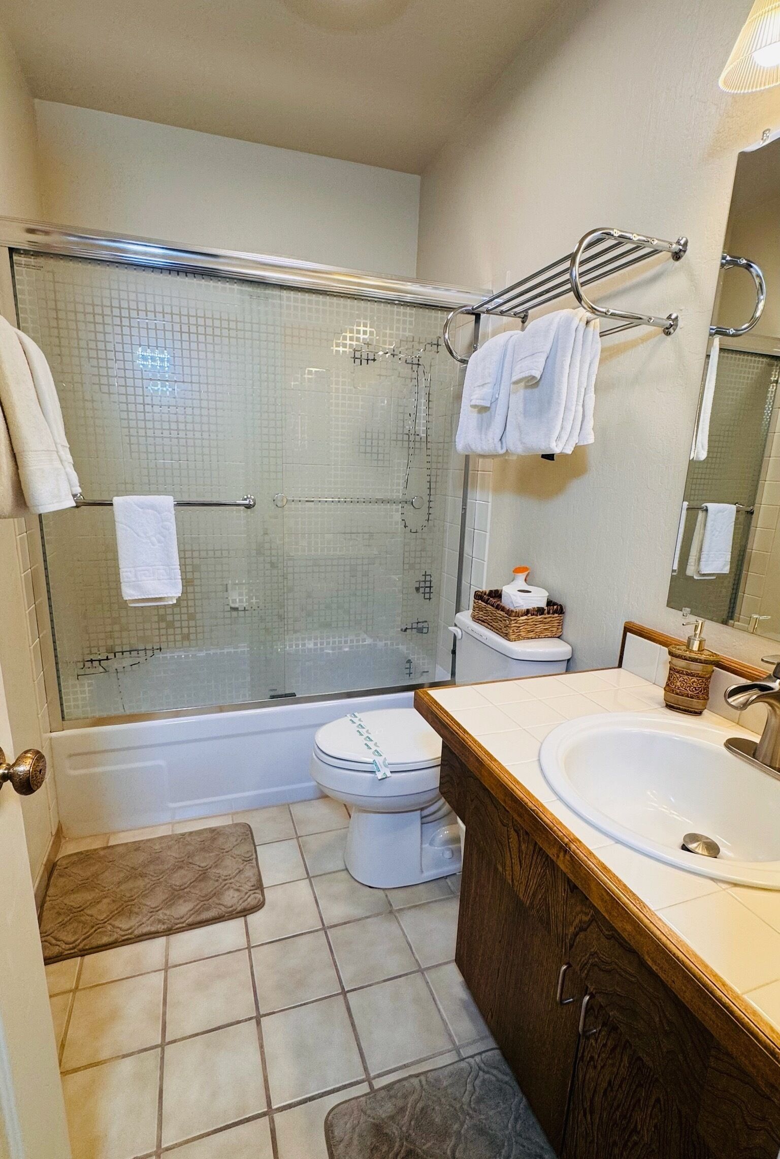 Combined shower/bathtub, hair dryer, towels, soap