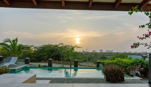 Exclusive adults only retreat close by the beach with breathtaking views.