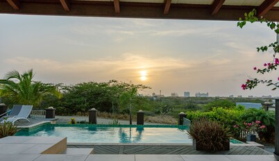 Exclusive adults only retreat close by the beach with breathtaking views.