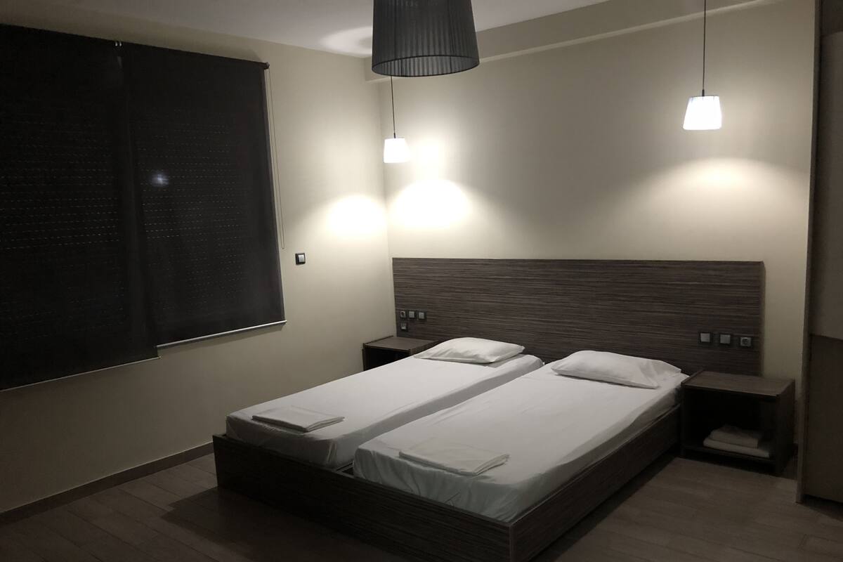 Family Studio, 2 Single Beds, Kitchenette | Desk, blackout curtains, soundproofing, iron/ironing board