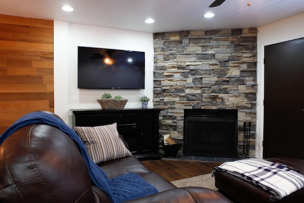 Smart TV, fireplace, DVD player, foosball