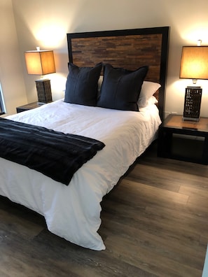 Master Bedroom - Queen sized bed, TV and Master Bathroom