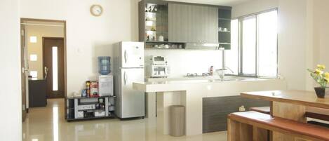 Fridge, microwave, stovetop, coffee/tea maker