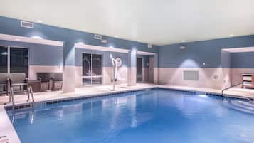 Indoor pool, open 7:00 AM to 11:00 PM, pool loungers