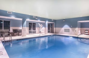 Indoor pool, open 7:00 AM to 11:00 PM, pool loungers