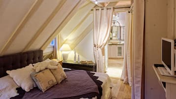 1 habitación, tabla de planchar con plancha y cuna de viaje