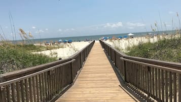 On the beach, sun-loungers, beach towels