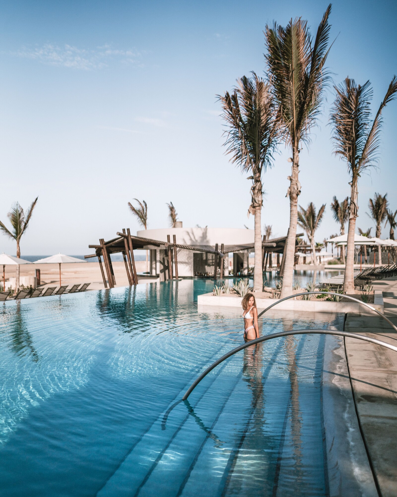 5 outdoor pools, open 8:00 AM to 7:00 PM, pool umbrellas, sun loungers