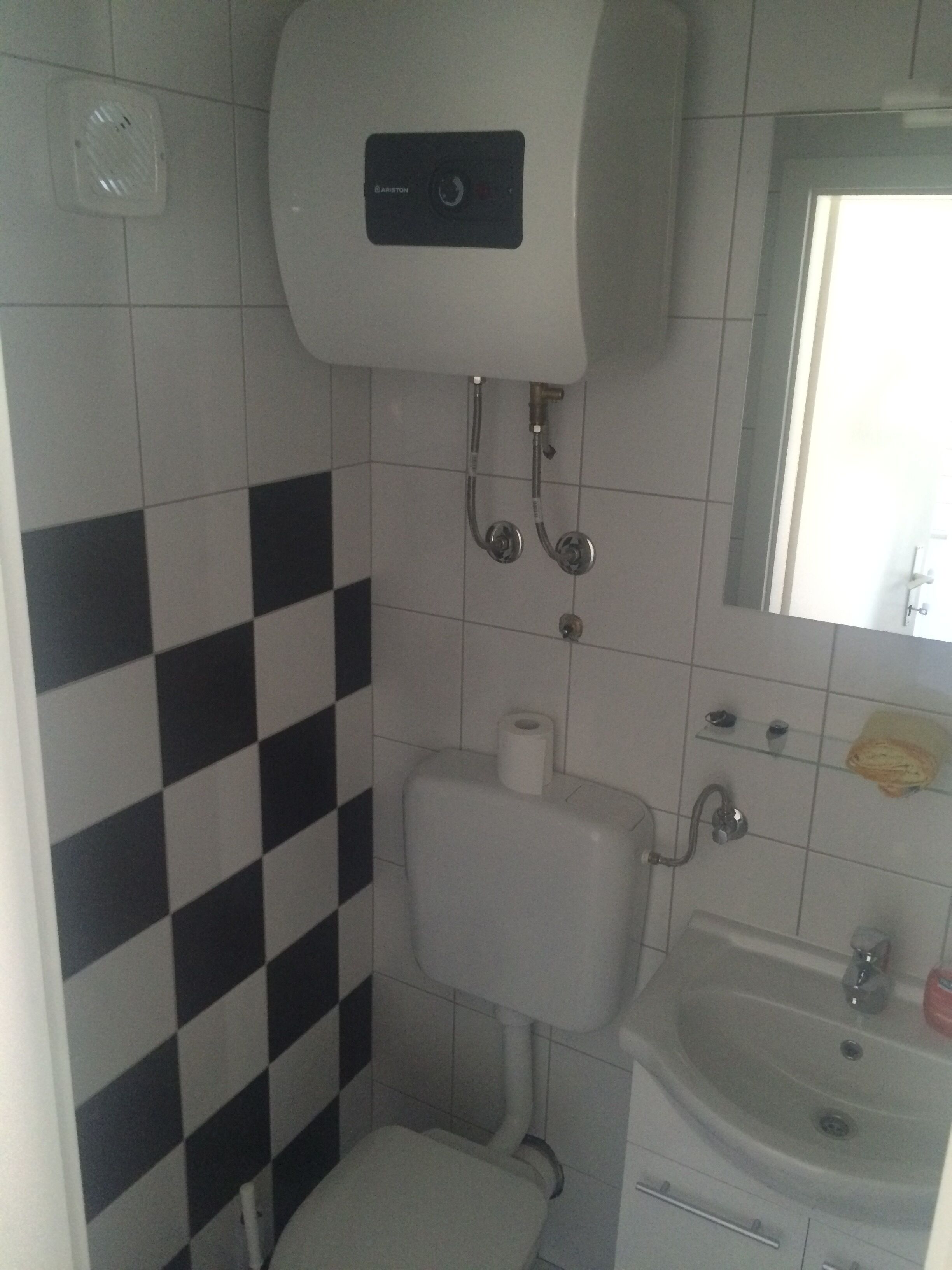 Shower, hair dryer, towels, toilet paper