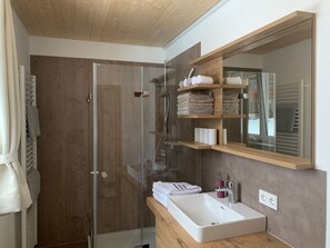 Standard Apartment | Bathroom | Hair dryer, towels, soap