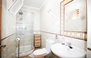Bathtub, hair dryer, towels
