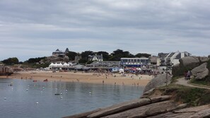 On the beach, sun-loungers