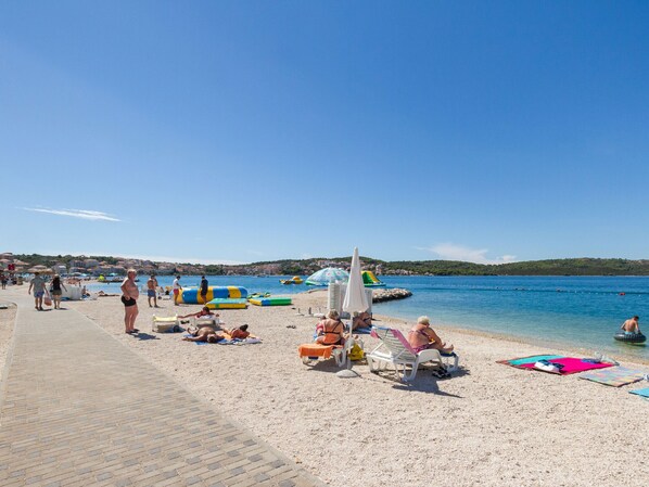 Beach nearby, sun loungers