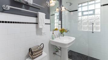 Shower, hair dryer, towels, soap