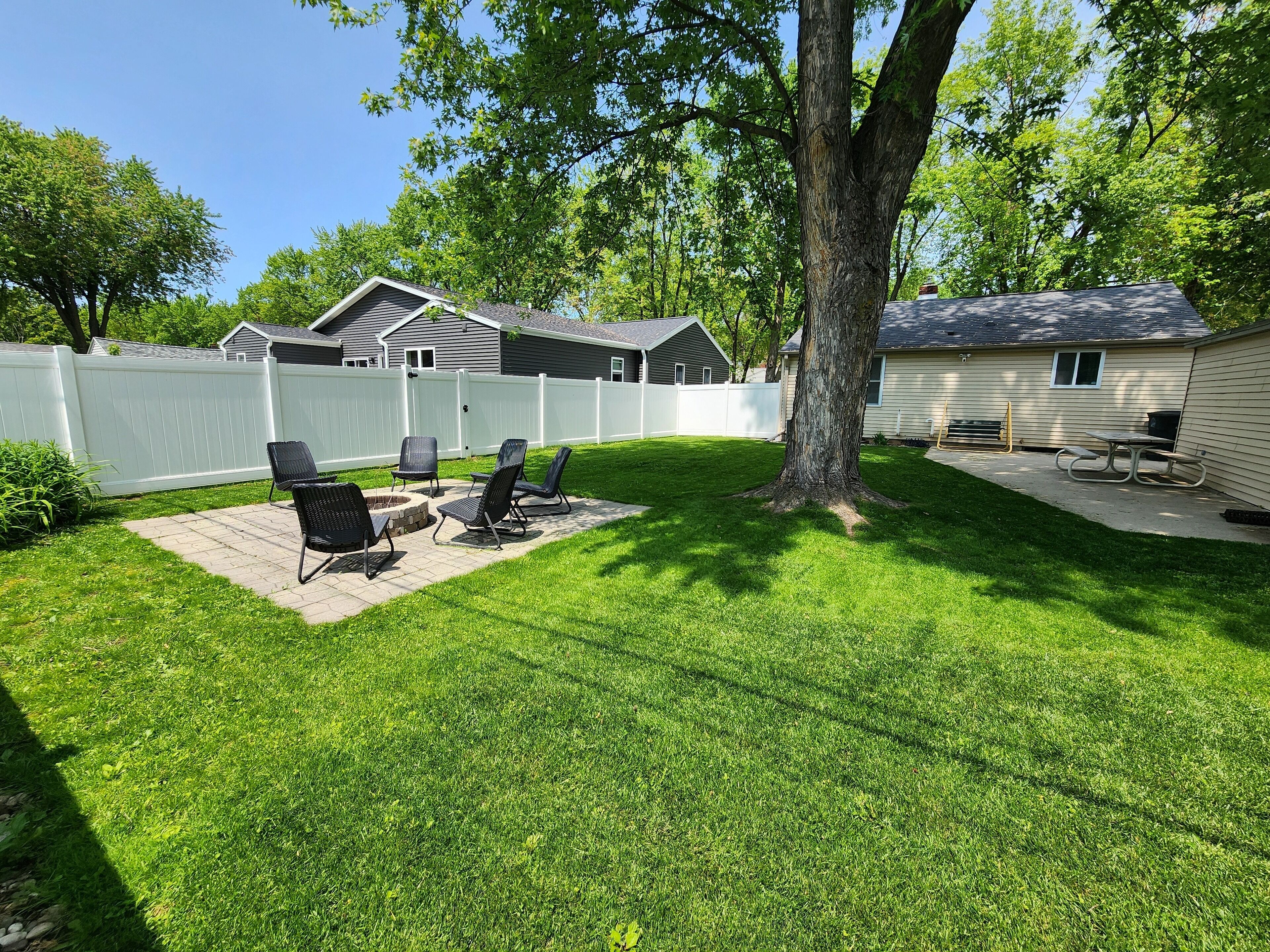 Enjoy beautiful Wisconsin weather while tailgating in the large fenced backyard