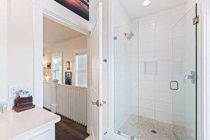 Shower, hair dryer, towels, shampoo