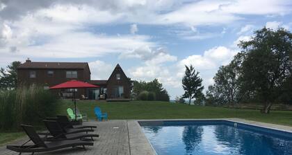 Hilltop Getaway with a Saltwater Heated Pool
Sleeps 12 ~ 5 Bedroom, 2 Bath