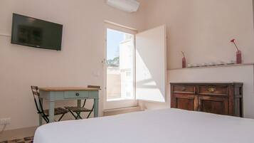 Desk, iron/ironing board, travel crib, WiFi