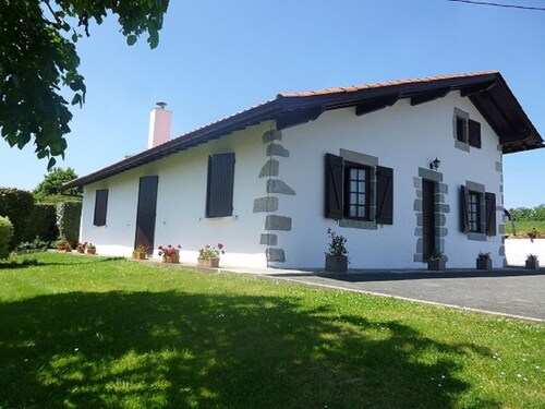 Basque house located between sea and mountains.