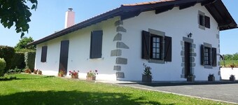 Basque house located between sea and mountains.