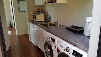 Fridge, microwave, stovetop, coffee/tea maker