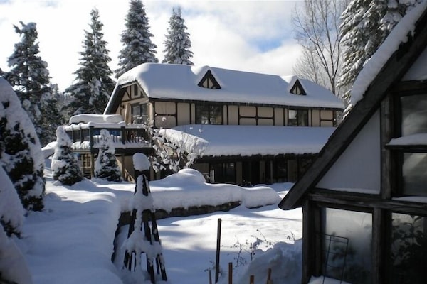 Wintertime. Between John's snowblower and a hired loader, road is always open.