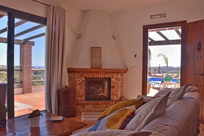 Smart TV, fireplace, books