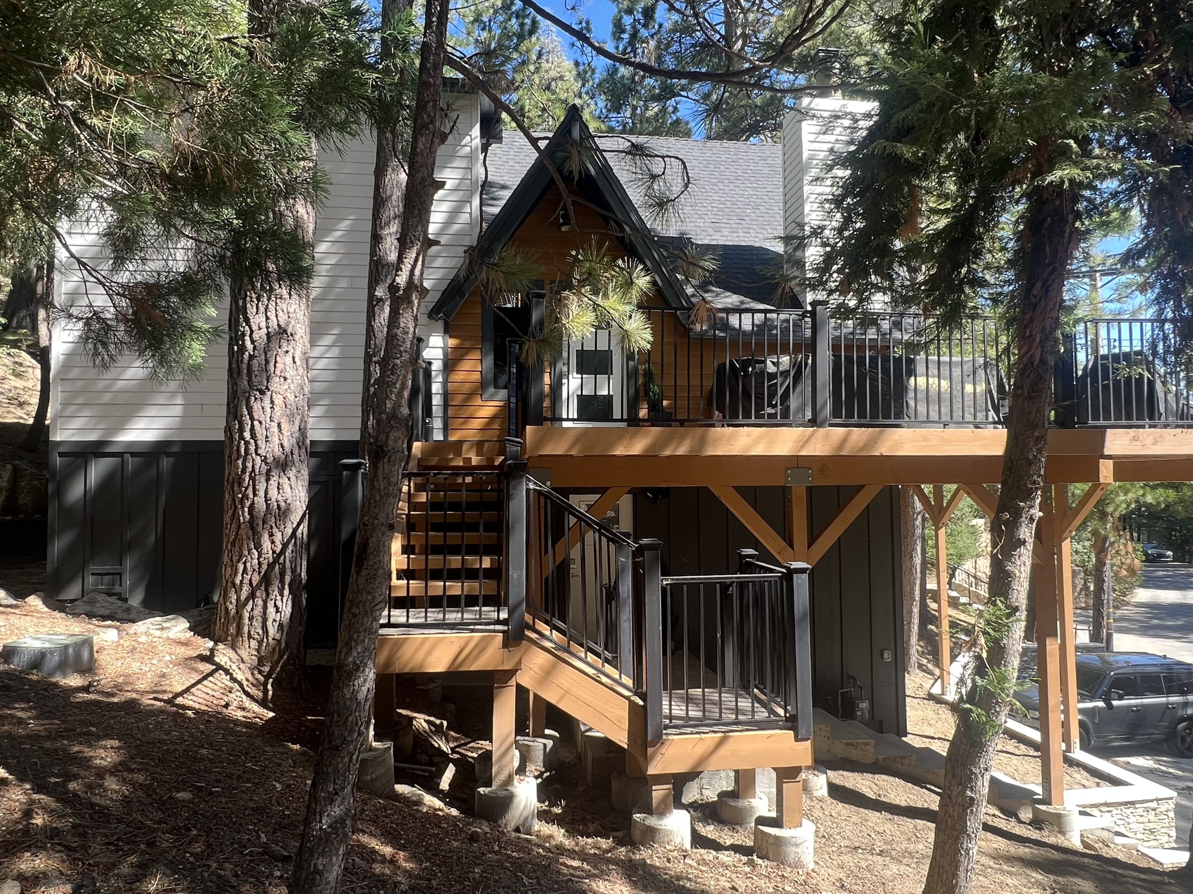 Beautiful updated 3 level home with high ceilings, a wall of windows & game room