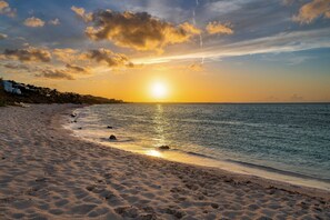 On the beach, sun loungers, beach towels