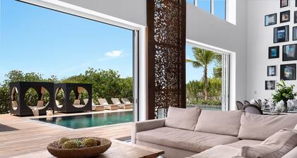 Stunning Beach Front Villa with Full Staff