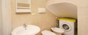 Hair dryer, towels - One Bedroom Apartment (Ostuni)