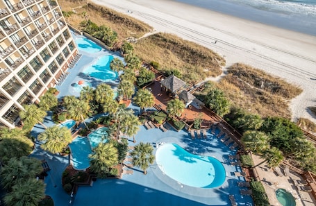 Indoor pool, outdoor pool. Just redecorated- True one bedroom king oceanfront condo at tropical resort!