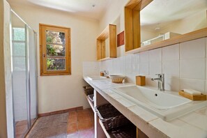 Shower, hair dryer, towels, soap