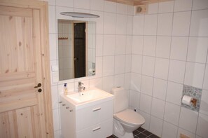 Combined shower/bathtub