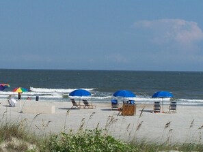 On the beach, sun-loungers, beach towels