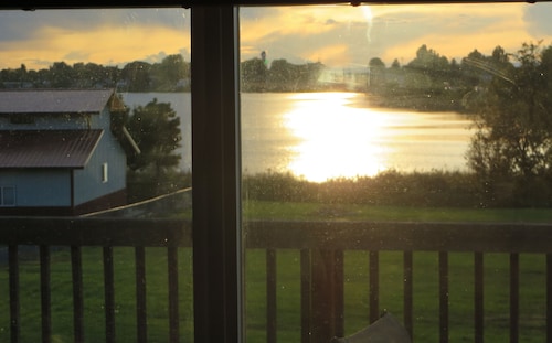 Cozy & affordable  Waterfront  one acre fully fenced.  Use our dock May -October