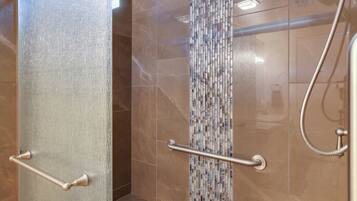 Combined shower/tub, hair dryer, towels, soap