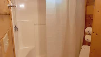 Shower, hair dryer, towels, toilet paper