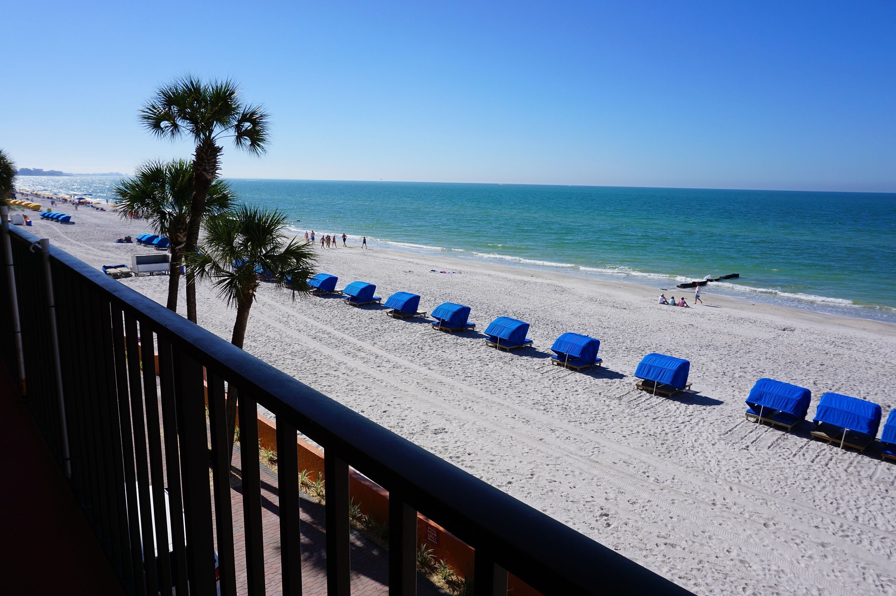 On the beach, sun loungers, beach towels