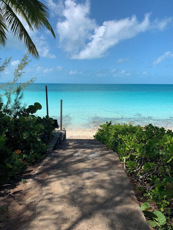 On the beach, sun-loungers, beach towels