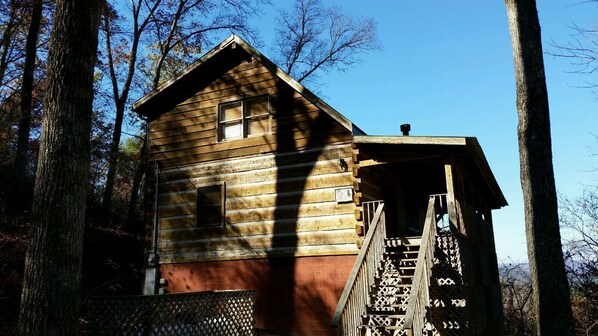 A wooden cabin with a steep staircase leading up to a porch. - Cabin with beautiful view, on 'Peaceful Side of the Smokies' (Townsend)